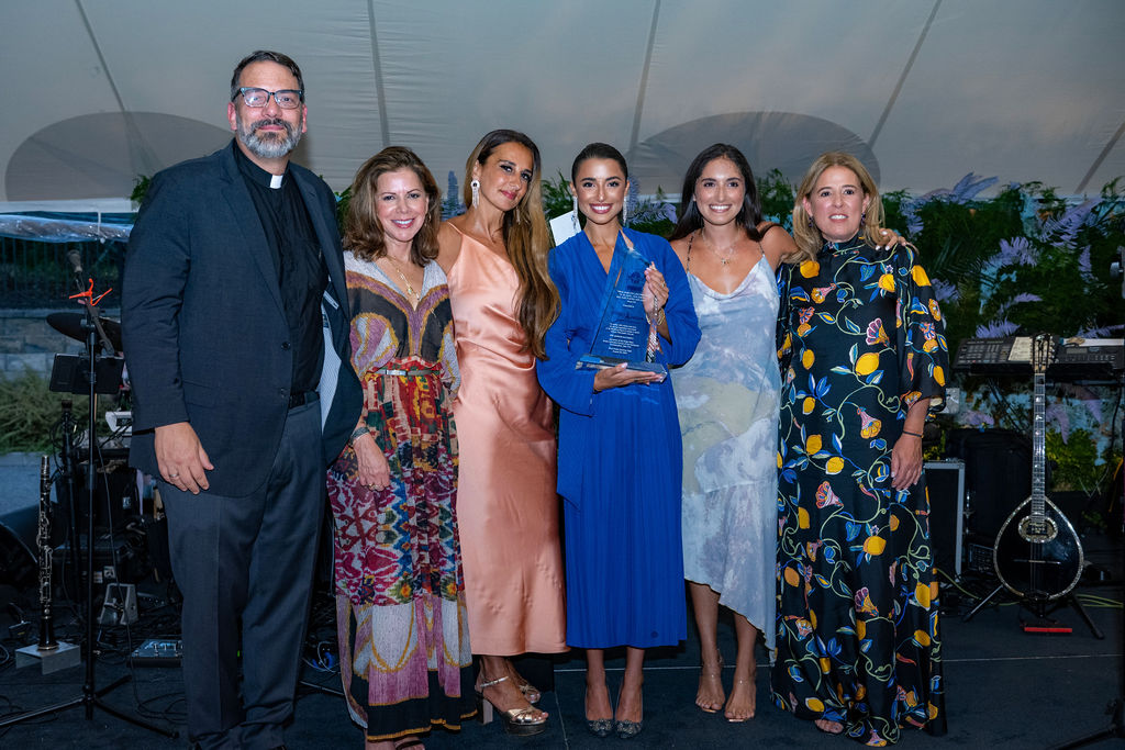 Mariana and Carli Pantelidis accepting award at the Blue Dream Gala