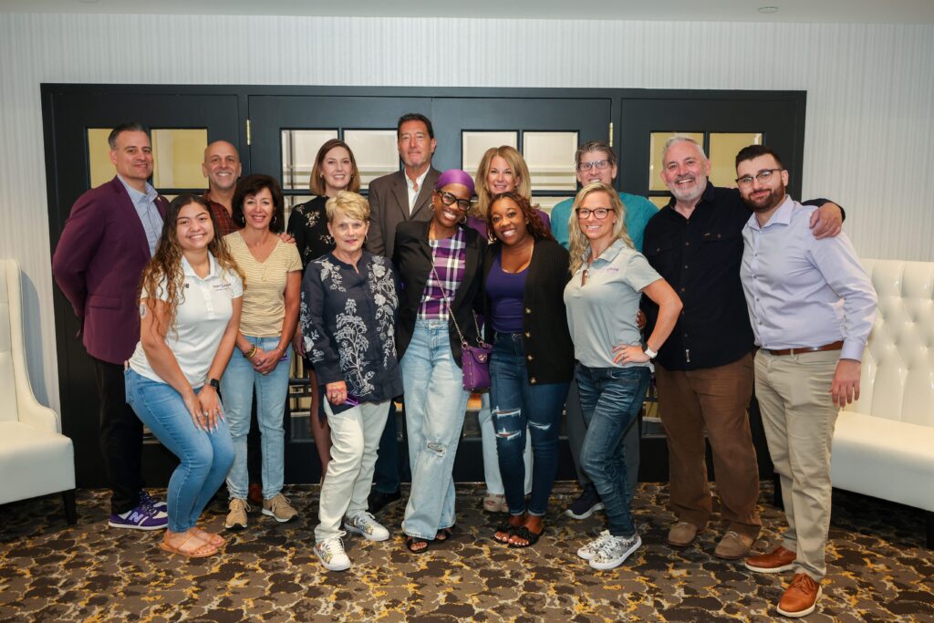 Pancreatic cancer survivors, family members, and Project Purple Staff together at the Survivors' Summit