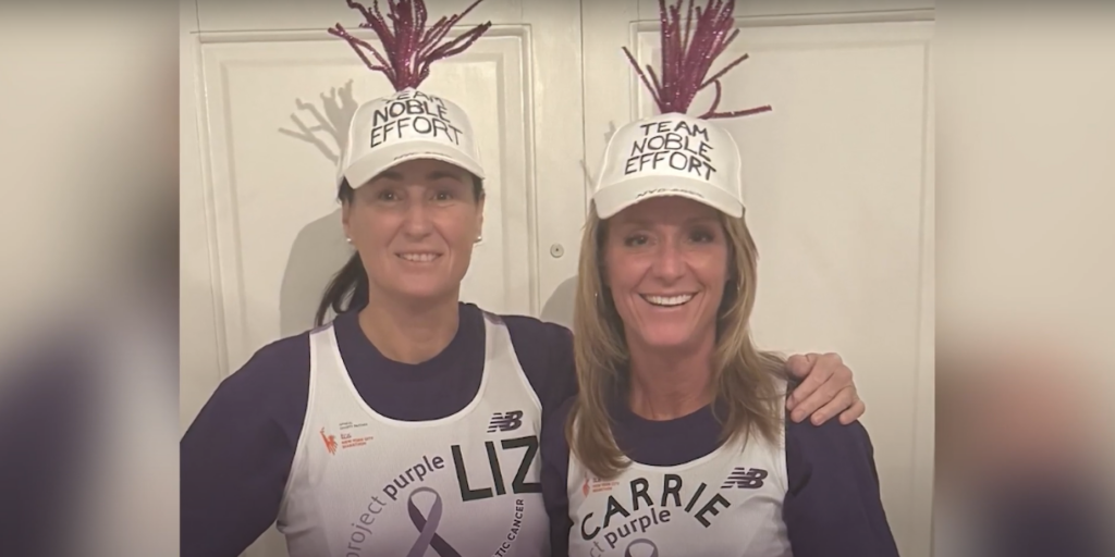 Elizabeth Allen And Carrie Fitzgerald with Team Noble Effort Mohawk Hats and Project Purple singlets